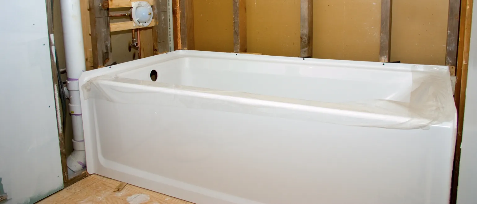 Bathroom remodeling in Los Angeles with bathtub installation, exposed plumbing rough-in, wall framing, and renovation preparation for a modern bathroom upgrade