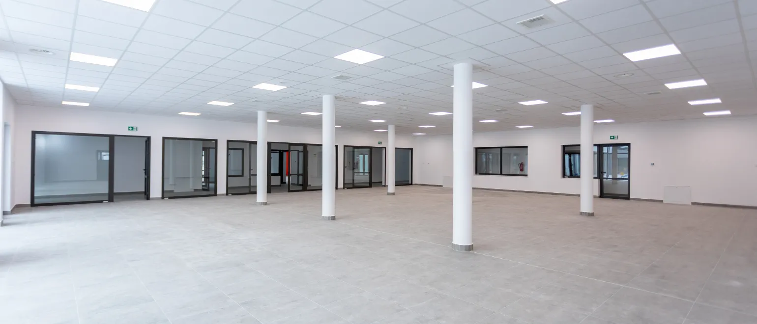 Los Angeles commercial remodeling project with finished office and retail interior, upgraded ceiling lighting, open floor layout, and modern business renovation