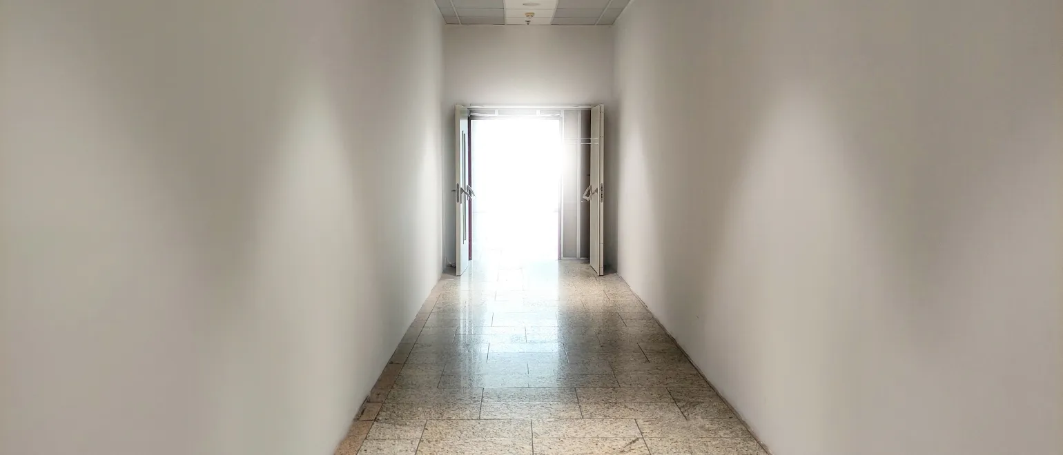 Los Angeles HOA remodeling project for condo building corridor upgrade with clean wall finishes, tile flooring, entry access, and shared space renovation