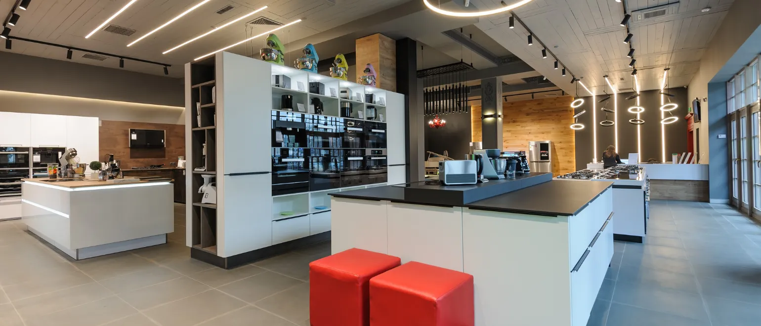 After commercial remodeling project in Los Angeles with modern showroom buildout, upgraded lighting, open layout, professional display areas, and business-ready interior renovation